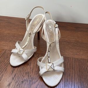 Original Gwen Stefani L.A.M.B. Sandals in white with gold hardware.